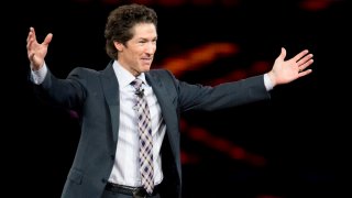 FILE - Pastor Joel Osteen speaks during MegaFest at the American Airlines Center on Aug. 30, 2013, in Dallas, Texas.