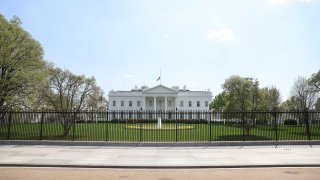 The White House from Pennsylvania Avenue outside the White House in Washington, on April 7, 2021.