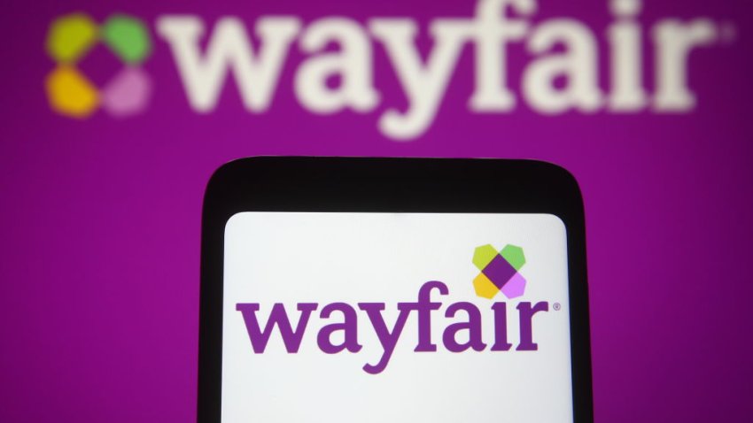 UKRAINE – 2021/03/31: In this photo illustration, the Wayfair logo of the US e-commerce company seen displayed on a smartphone and a pc screen. (Photo Illustration by Pavlo Gonchar/SOPA Images/LightRocket via Getty Images)