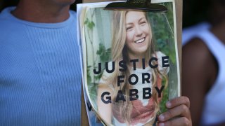 FILE - Supporters of “Justice for Gabby” gathered at the entrance of Myakkahatchee Creek Environmental Park in North Port Florida October 20, 2021.