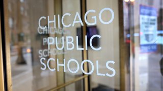 CHICAGO, ILLINOIS – JANUARY 05: A sign is displayed on the front of the headquarters for Chicago Public Schools on January 05, 2022 in Chicago, Illinois. Classes at all of Chicago public schools have been canceled today by the school district after the teacher’s union voted to return to virtual learning citing unsafe conditions in the schools as the Omicron variant of the COVID-19 virus continues to spread. (Photo by Scott Olson/Getty Images)
