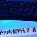 The National Flag of the People's Republic of China arrives during the opening ceremony of the 2022 Winter Olympics, Friday, Feb. 4, 2022, in Beijing.