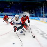 Sean Farrell of USA and Alex Grant of Canada during the Men's Preliminary Round Group A match between USA and Canada on day eight of the 2022 Winter Olympics at National Indoor Stadium in Beijing, China on Feb. 12, 2022.