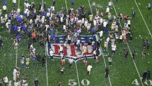 Confettis are falling on the field after the Rams victory