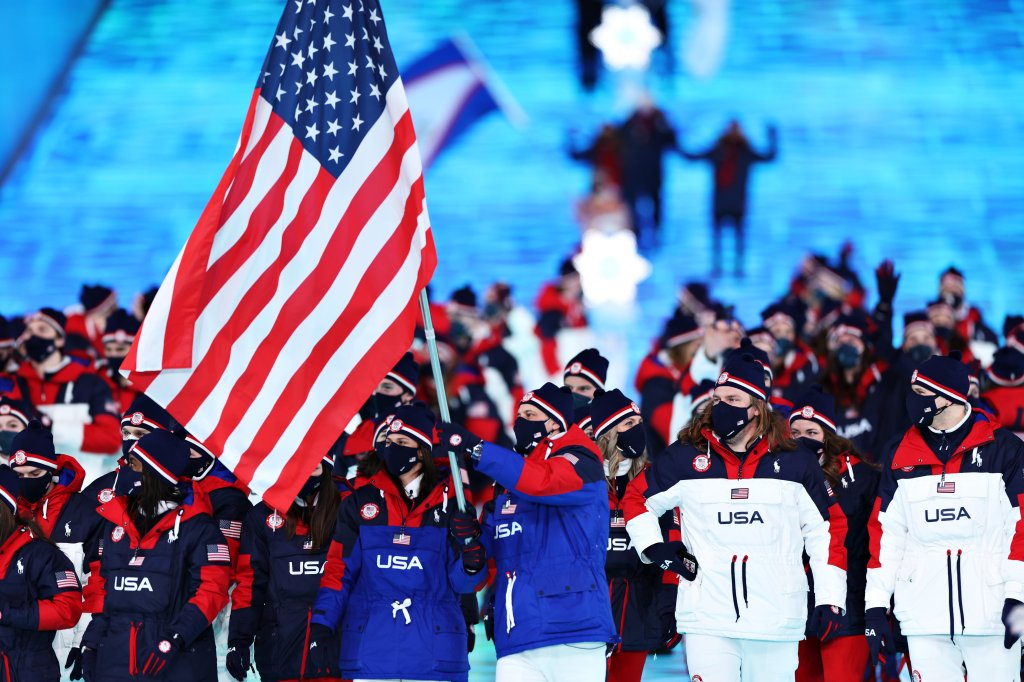 Flag bearers Brittany Bowe and John Shuster of Team USA lead the team during the Opening Ceremony of the Beijing 2022 Winter Olympics at the Beijing National Stadium on Feb. 4, 2022 in Beijing, China. 