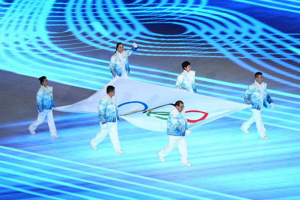 Zhihuan Luo, Hui Zhang, Jiajun Li, Xue Shen, Xiaopeng Han and Hong Zhang carry the Olympic Flag during the Opening Ceremony of the Beijing 2022 Winter Olympics at the Beijing National Stadium on Feb. 4, 2022 in Beijing, China.