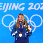 Chloe Kim of Team United States celebrates with her gold medal at the Women's Snowboard Halfpipe medal ceremony at the 2022 Winter Olympic Games, Beijing Medal Plaza, Feb. 10, 2022 in Beijing, China.