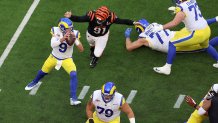 Trey Hendrickson of the Cincinnati Bengals looks to sack Matthew Stafford