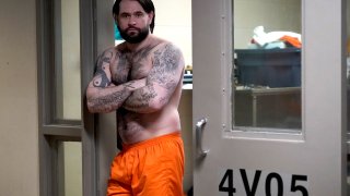 Erik Eck, a former member of the Latin Kings gang stands in the doorway of his cell