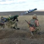 Ukrainian soldiers use a launcher with US Javelin missiles