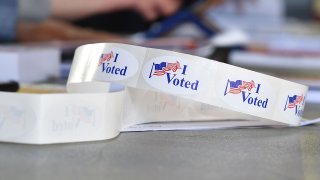I VOTED stickers are seen at a polling station on the campus of the University of California, Irvine, on November 6, 2018 in Irvine, California on election day. – Americans vote Tuesday in critical midterm elections that mark the first major voter test of Donald Trump’s presidency, with control of Congress at stake. (Photo by Robyn Beck / AFP) (Photo by ROBYN BECK/AFP via Getty Images)