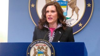 FILE - Mich. Gov. Gretchen Whitmer speaks at a news conference on Friday, March 11, 2022, at the governor's office in Lansing, Mich. Michigan lawmakers voted Tuesday, March 15, 2022 to suspend the state's 27.2-cents-a-gallon gasoline and diesel taxes for six months, finalizing a bill that Gov. Gretchen Whitmer has signaled she will veto.