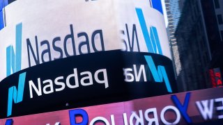 The Nasdaq logo is displayed at the Nasdaq Market site in Times Square in New York City, December 3, 2021.