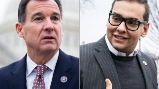 Rep. Tom Suozzi, D-N.Y., left, and George Santos, (R-NY) conducts a news conference to advocate for inclusion of the state and local tax (SALT) deduction in the Build Back Better Act reconciliation bill, outside the U.S. Capitol on Wednesday, December 8, 2021. (Photo By Tom Williams/CQ-Roll Call, Inc via Getty Images)