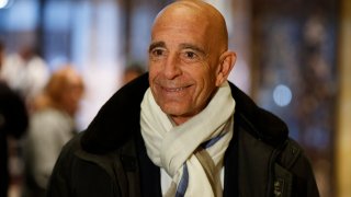 Tom Barrack, chairman of the inaugural committee, speaks with reporters in the lobby of Trump Tower in New York, Tuesday, Jan. 10, 2017, before meeting with President-elect Donald Trump.