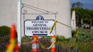 Crime scene tape surrounds Geneva Presbyterian Church on May 17, 2022, in Laguna Woods, Calif.