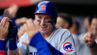 CINCINNATI, OHIO – MAY 24: Frank Schwindel #18 of the Chicago Cubs celebrates with teammates after hitting a two run home run during the first inning in the game against the Cincinnati Reds at Great American Ball Park on May 24, 2022 in Cincinnati, Ohio. (Photo by Justin Casterline/Getty Images)