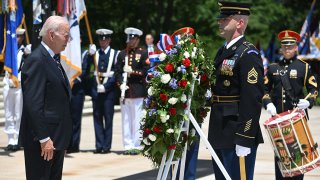 President Joe Biden participates in a wreath laying ceremony at the Tomb of the Unknown Soldier in honor of Memorial Day at Arlington National Cemetery in Arlington, Virginia, on May 30, 2022.