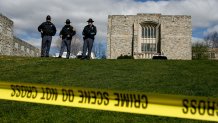 Virginia State Police stand guard outside Norris Hall