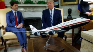 A model of the new Air Force One design sits on a table during a meeting between President Donald Trump and Canadian Prime Minister Justin Trudeau in the Oval Office of the White House, Thursday, June 20, 2019, in Washington.