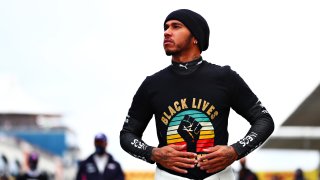 Lewis Hamilton of Great Britain and Mercedes GP wears a Black Lives Matter shirt