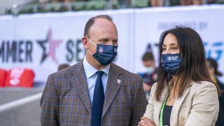 US Soccer CEO Will Wilson and Kate Markgraf of the USWNT talk before a game between Nigeria and USWNT at Q2 Stadium on June 16, 2021 in Austin, Texas.