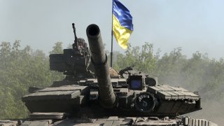 Ukrainian troop ride a tank