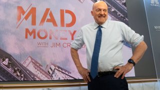 Jim Cramer at the NYSE with Mad Money graphic, June 30, 2022.