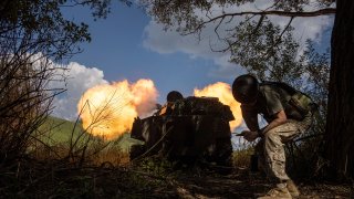 FILE - Ukrainian self-propelled artillery shoots