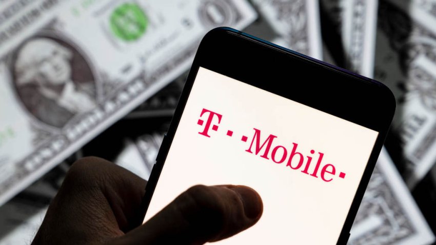 CHINA – 2021/04/23: In this photo illustration the mobile communications subsidiaries of the German telecommunications company Deutsche Telekom AG, T-Mobile, logo seen displayed on a smartphone with USD (United States dollar) currency in the background. (Photo Illustration by Budrul Chukrut/SOPA Images/LightRocket via Getty Images)