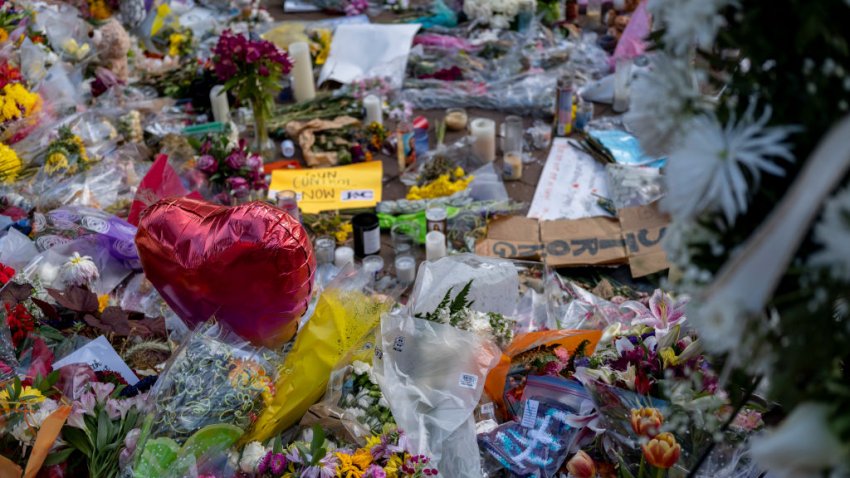 HIGHLAND PARK, IL – JULY 10:  A make-shift memorial has sprung in the city center near where police say accused shooter Robert “Bobby” E. Crimo III opened fire on a crowd during a Fourth of July parade, is shown July 10, 2022 in Highland Park, Illinois. Authorities have charged Crimo, 22, with seven counts of first-degree murder in the attack that also injured 47.  (Photo by Jim Vondruska/Getty Images)