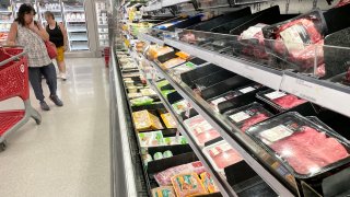 A customer shops for meat at a Target store on June 08, 2022 in San Rafael, California.