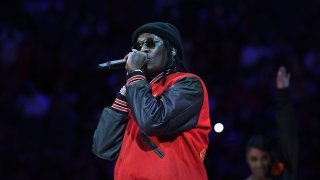 ATLANTA, GA – NOVEMBER 17: Young Thug performs at half time at the game between the Atlanta Hawks and the Boston Celtics on November 17, 2021 at State Farm Arena in Atlanta, Georgia. NOTE TO USER: User expressly acknowledges and agrees that, by downloading and/or using this Photograph, user is consenting to the terms and conditions of the Getty Images License Agreement. Mandatory Copyright Notice: Copyright 2021 NBAE