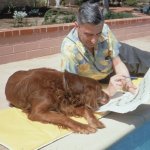 Dr Seuss and his dog outdoors