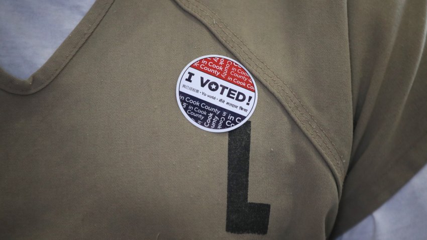 An inmate at the Cook County jail in Chicago wears an “I Voted” sticker after voting in the Illinois primary election in 2020.