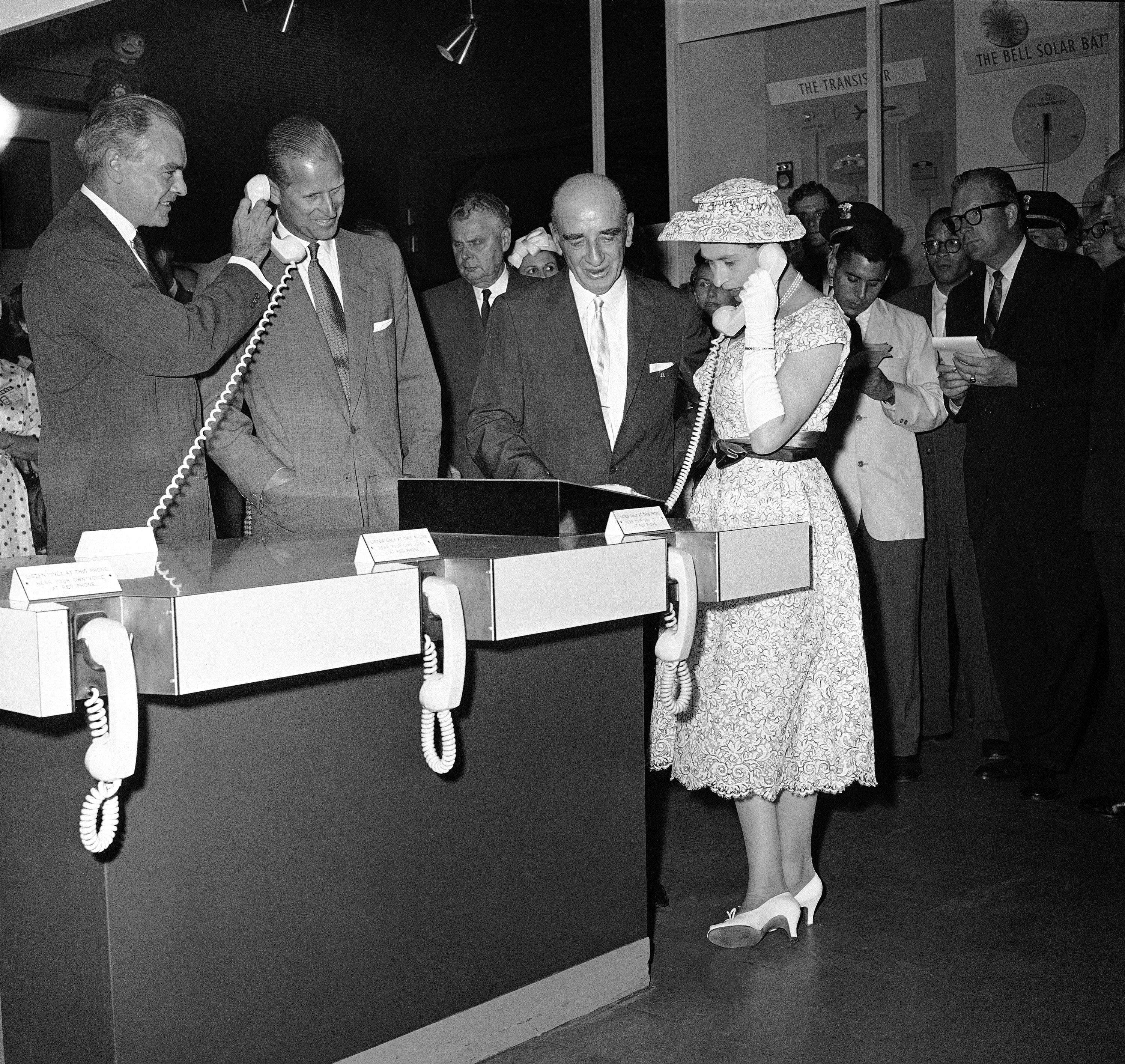 Queen Elizabeth II hears her own voice while visiting the Museum of Science and Industry in Chicago, July 6, 1959. She spoke into the phone and immediately heard what she said. Maj. Lenox Lohr of the museum explains the process. Between Lohr and the Queen are Prince Philip and Canada’s Prime Minister John G. Diefenbaker. (AP Photo/Edward Kitch)