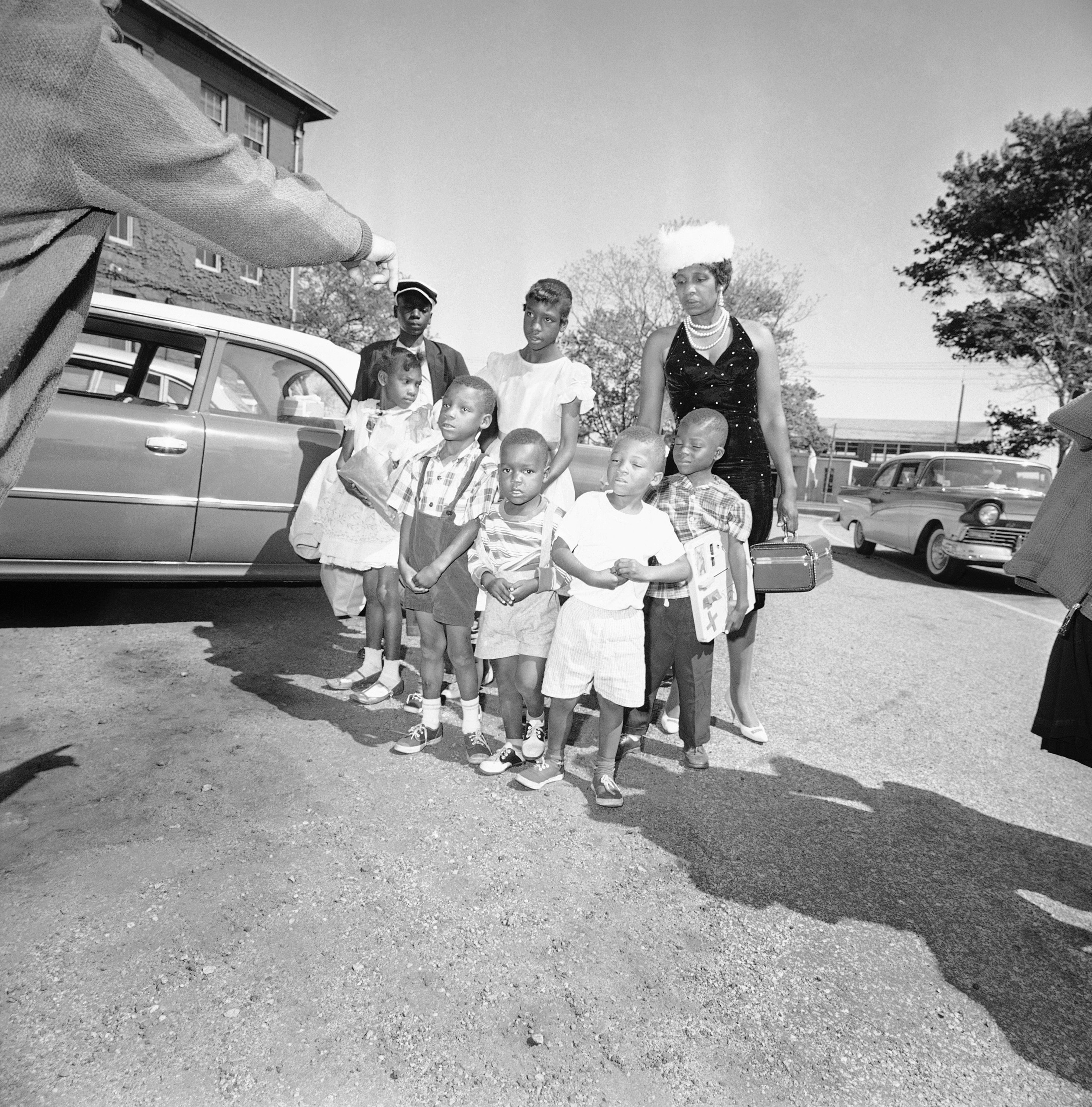 Lela Mae Williams, 36, of Huttig, Ark., and seven of her nine children on arrival in Hyannis, Mass., May 23, 1962. Mrs. Williams said she had been told she would find work in Hyannis as a domestic, babysitter, or laundress, and be able to support her seven sons and two daughters.