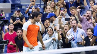 Fans cheer Carlos Alcaraz from Spain after his win against Marin Cilic from Croatia in their fourth round 2022 US Open Tennis tournament men’s singles match at the USTA Billie Jean King National Tennis Center in New York on September 5, 2022.