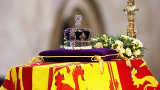 The Imperial State Crown is seen on the coffin carrying Queen Elizabeth II, inside the Palace of Westminster Sept. 14, 2022 in London, England.