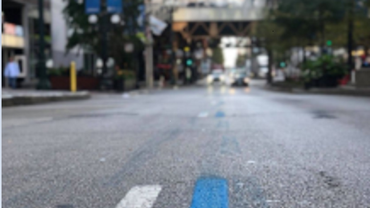 What Blue Line Painted on City Streets Means For Chicago Marathon
