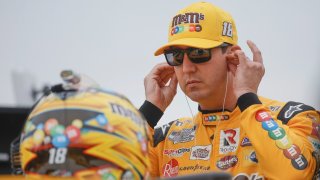 Kyle Busch, driver of the #18 M&M’s Toyota, prepares to practice for the NASCAR Cup Series Hollywood Casino 400 at Kansas Speedway on September 10, 2022 in Kansas City, Kansas.