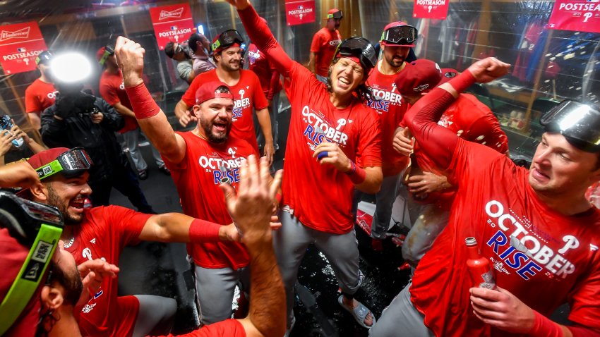 Phillies celebrate playoffs in locker room