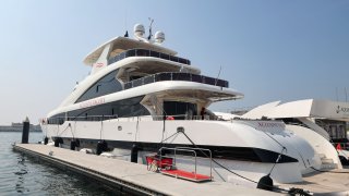 A yacht that can be rented to watch the World Cup while sailing around Dubai is docked in Dubai harbor on November 1, 2022, ahead of the Qatar 2022 FIFA World Cup football tournament. Photo by Giuseppe CACACE / AFP) (Photo by GIUSEPPE CACACE/AFP via Getty Images)