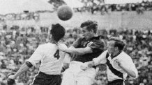 England midfielder Thomas Finney, center, tries to head the ball past USA defenders Charlie Colombo and Edward John McIlvenny during the World Cup first round match between England and USA on June 29 1950. The United States rout heavy favorites England 1–0 with a goal scored by striker Joseph Gaetjens.