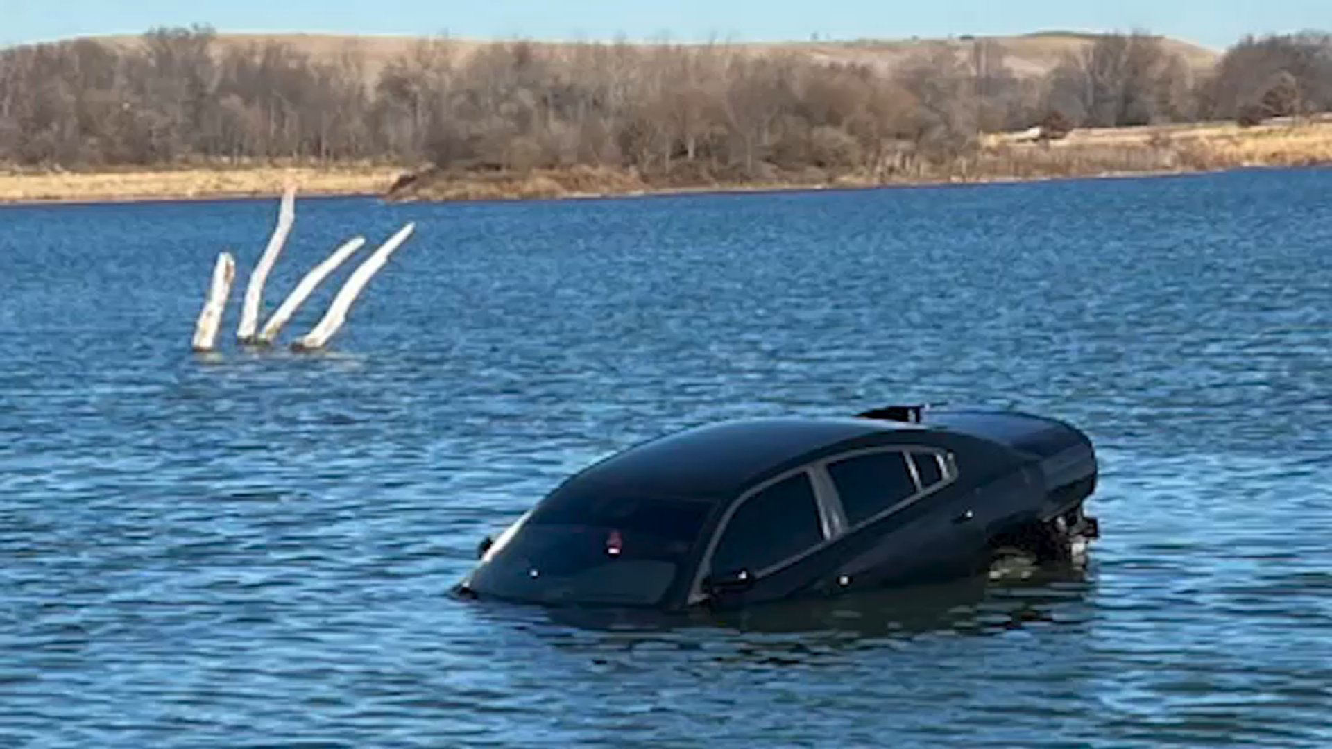Bolingbrook Firefighters  Rescue Driver After Car Ends Up in Lake