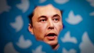 An image of new Twitter owner Elon Musk is seen surrounded by Twitter logos in this photo illustration in Warsaw, Poland on 08 November, 2022. 