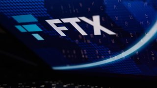 The FTX logo on a laptop screen.