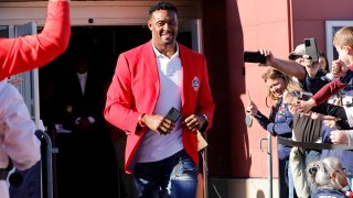 This Oct. 23, 2021, file photo shows Willie McGinest be introduced during the Patriots Hall of Fame Induction Ceremony at Gillette Stadium in Foxborough, Massachusetts.