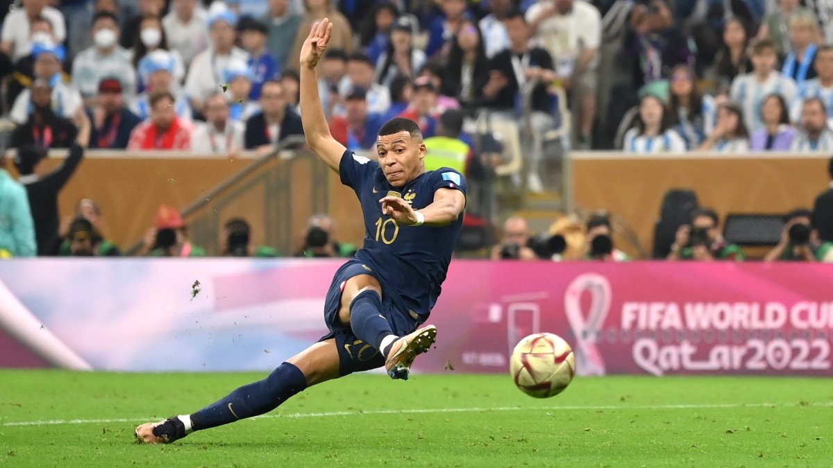  Kylian Mbappe is seen scoring a goal during the FIFA World Cup 2022 in Qatar.