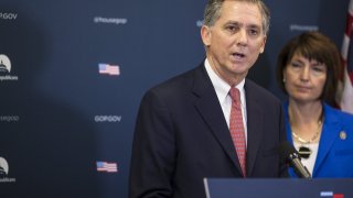 Representative French Hill, a Republican from Arkansas, left, speaks during a news conference on Capitol Hill in Washington, D.C., July 24, 2018.